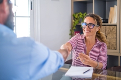 smiling-caucasian-female-hr-manager-handshake-hire-2021-09-02-08-44-13-utc-1-1